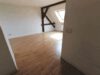 Dachgeschosswohnung mit offener Küche - Wohnzimmer